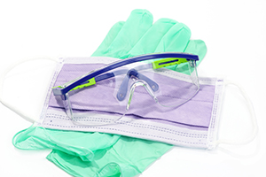 Gloves, mask, and safety glasses for personal protection.